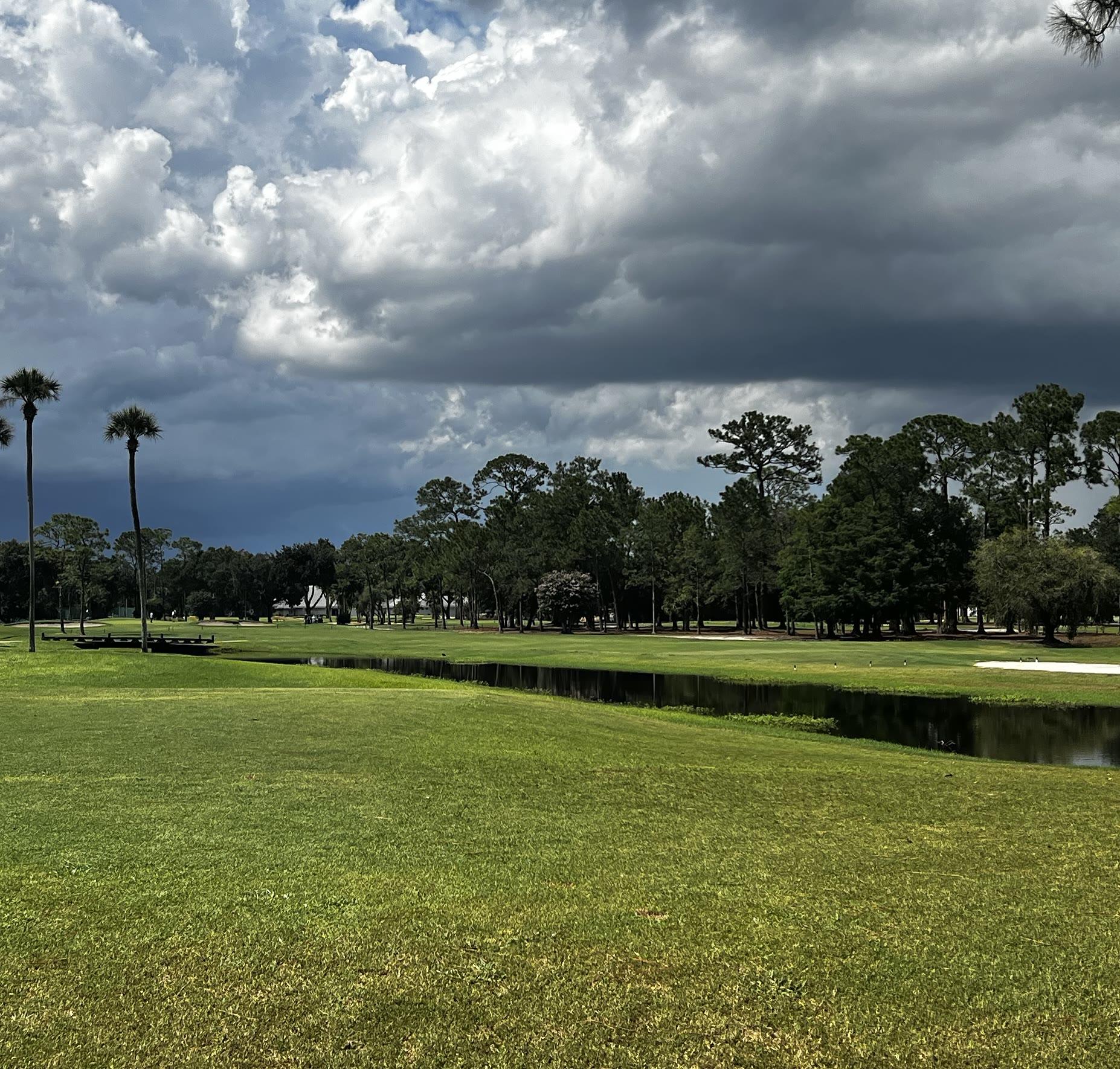 Rio Pinar Golf Club under a dramatic Florida sky